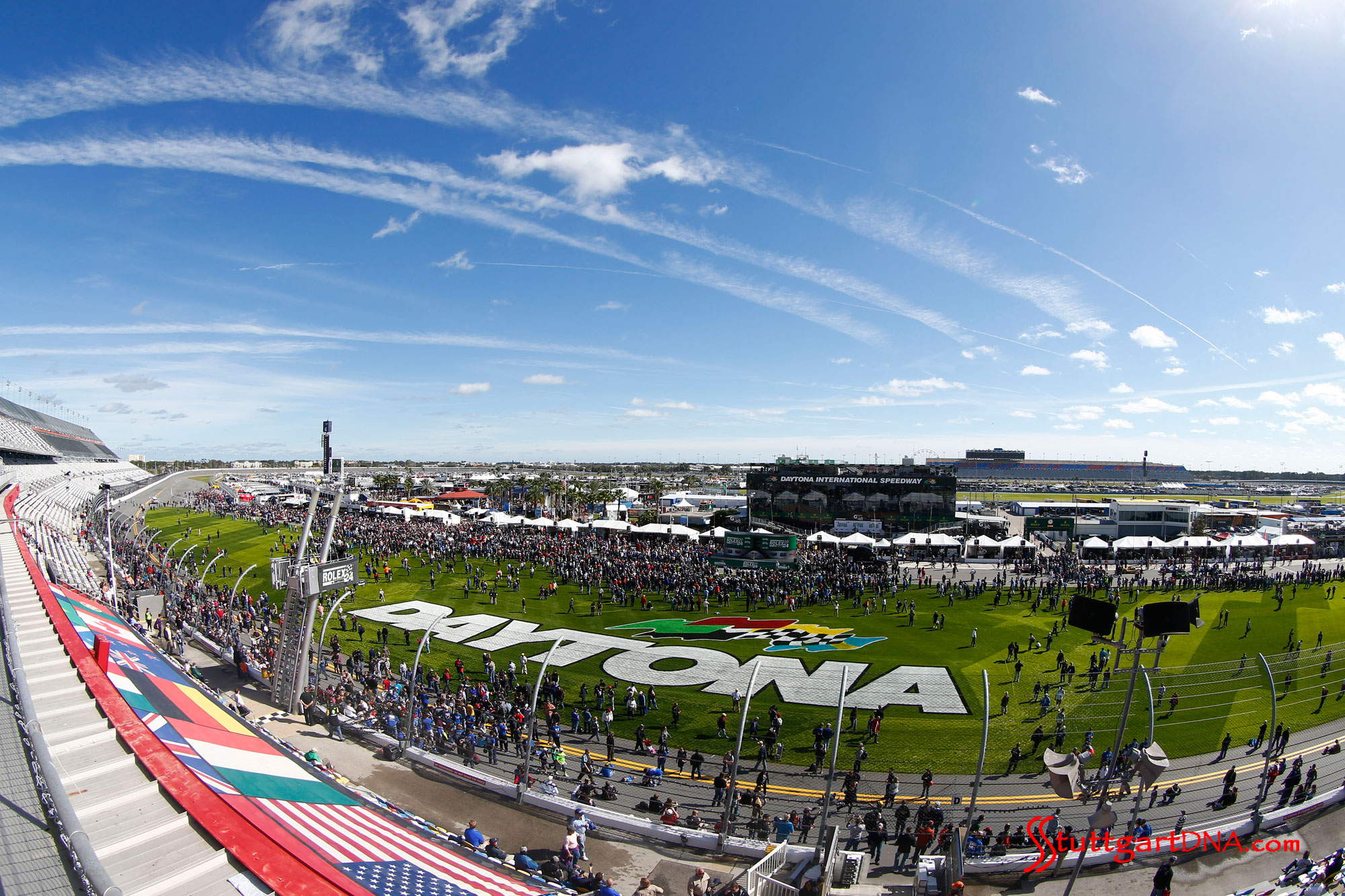 Porsche 2015 Daytona 24 hours Porsche 2015 Daytona 24 hours: A fisheye-lens view of the Daytona track, with Daytona lettering on grass in the in-field. Credit: PMNA