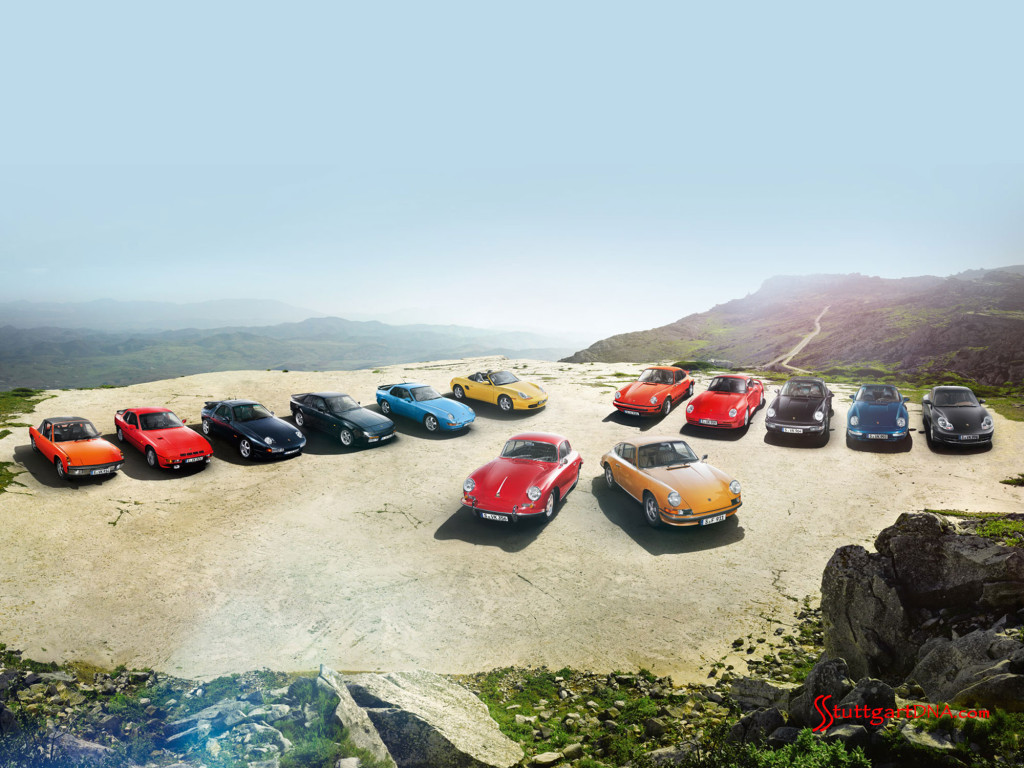 Porsche Classic Centers opening worldwide: Porsche classics -- from 356s and 911s, to 928s, 944s and Boxsters -- are seen parked on a high plateau overlooking picturesque mountainous terrain in the distance. Credit: Porsche AG