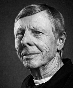 Black & white portrait of Gijs van Lennep; pictured here for Magic Moments in Le Mans. Credit: Porsche AG