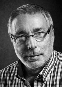 A black-&-white portrait of past Le Mans winner Jurgen Barth; pictured here for Magic Moments in Le Mans. Credit: Porsche AG