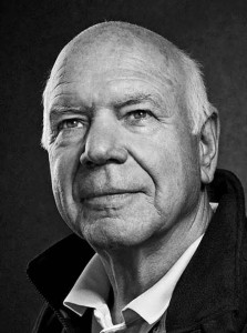 A black & white portrait of former Porsche Le Mans racer Rudi Lins; pictured here for Magic Moments in Le Mans. Credit: Porsche AG