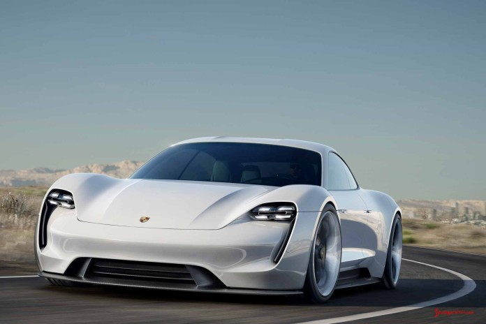 Porsche Mission E Concept Car: Mission E left-front on Mulholland with LA skyline in b.g. Credit: Porsche AG