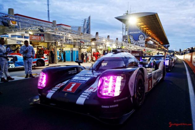Porsche garners 18th overall win at 84th Le Mans 2016: 919 No. 1 at pit out at dawn. Credit: Porsche AG