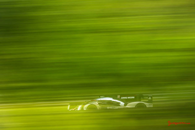 Porsche garners 18th overall win at 84th Le Mans 2016: No. 2 919 in green forest blur. Credit: Porsche AG