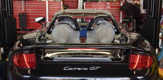 2017 Porsche L.A. Literature, Toy and Memorabilia Meet Weekend Black "Big Boxster" Porsche Carrera GT, rear, at Callas Rennsport during the 2017 Porsche Lit Week. Credit: StuttgartDNA