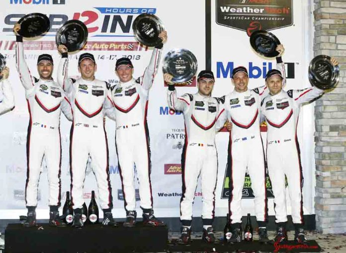 Porsche wins 2018 Sebring 12 Hours GTLM Class: Seen celebrating their 1st and 3rd place wins, respectively, are Frédéric Makowiecki, Nick Tandy, Patrick Pilet, Laurens Vanthoor, Earl Bamber and Gianmaria Bruni (l-r). Credit: Porsche AG