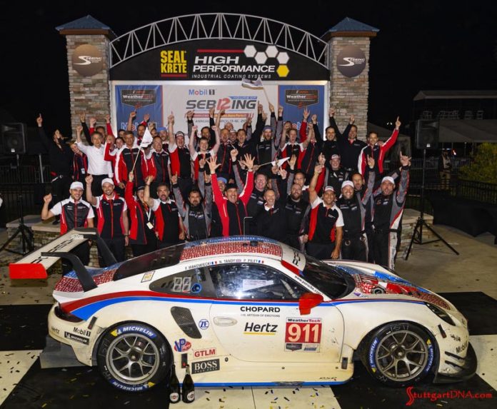 Porsche wins 2019 IMSA Sebring 12 Hours: Pictured here is the 2019 Sebring12 Hours-winning No 911 with its GT Team cheering in triumph in b.g. Credit: Porsche AG