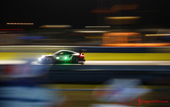 Porsche wins 2019 WEC Sebring 1000 Miles: Seen here is the No 91 from its left side at speed on the Sebring track against the surreal nighttime neon blur. Credit: Porsche AG