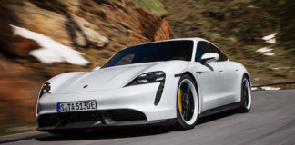 Porsche Taycan first electric sports car world premiere Porsche Taycan first electric sports car world premiere: Depicted here is a gleaming white Taycan Turbo S, left-front, tooling at speed down a windy mountain road. Credit: Porsche AG