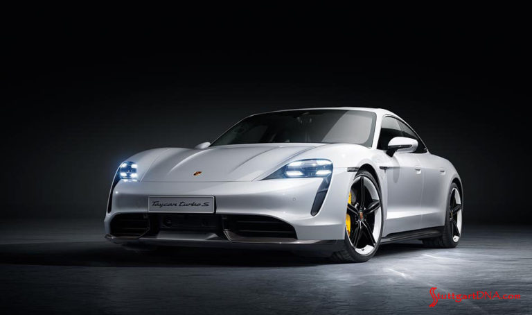 Porsche first-quarter 2020 USA retail sales - Porsche Taycan first electric sports car world premiere: A white Taycan Turbo S, left-front, is poised under soft, gorgeous lighting in this studio photo. Credit: Porsche AG