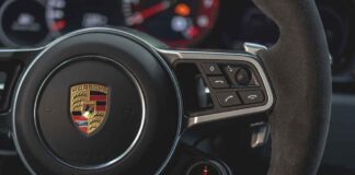 Porsche second-quarter 2020 USA retail sales Porsche second-quarter 2020 USA retail sales: Seen here is the Porsche crest centered on the steering wheel of a Porsche 911. Credit: Porsche AG.