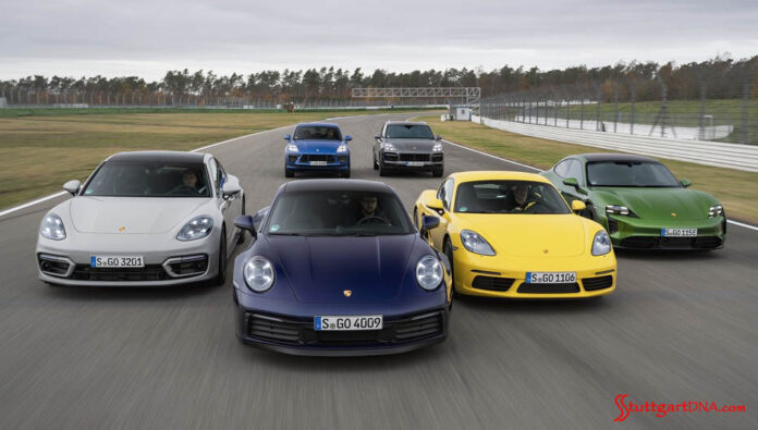 Depicted here is the entire model line running staggered on a racetrack — a veritable Porsche family portrait. Credit: Porsche