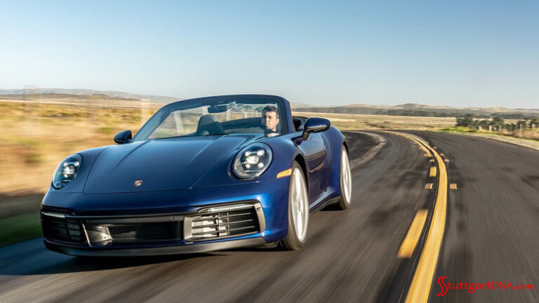 Porsche Recalls 911 for Windshields that May Detach: Pictured here is a blue 911 Carrera 911 S Cabriolet, seen from the left-front, cruising effortlessly down the highway. Credit: Porsche AG