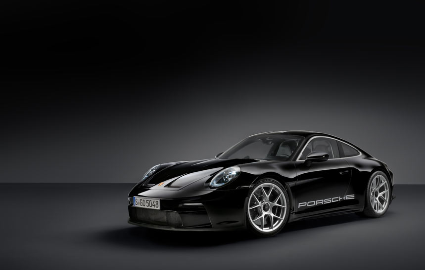 911 S/T - Seen here is a black 911 S/T photographed from its left-front view in a studio. Credit: Porsche AG