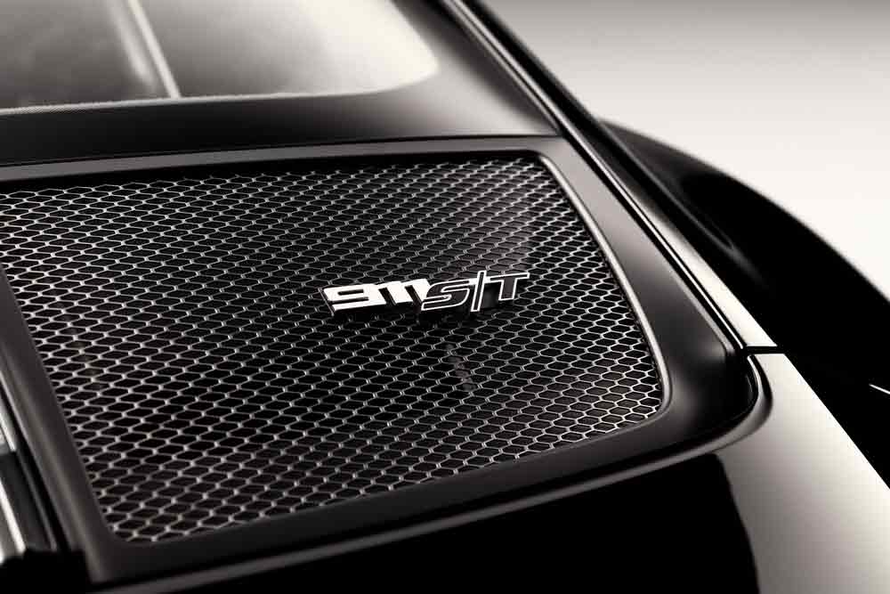 911-S/ T - Pictured here is a close-up of the 911-S/ T rear plain logo on the car's rear grill. Credit: Porsche AG