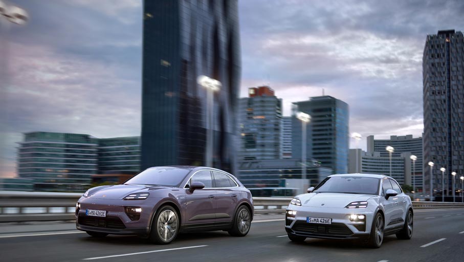 Porsche Macan EV unveiled: Boldly pictured here are the Macan 4 and Turbo traversing a metropolitan downtown bridge. Credit: Porsche AG