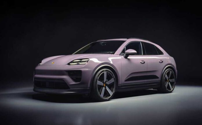 Porsche Macan EV: Depicted here is a Porsche Macan EV in lilac, left-front, poised in studio. Credit: Porsche AG