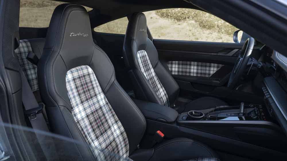 Introducing the Porsche 911 Turbo 50 Years model: Depicted here are the 911 Turbo 50 Years model's headrests and MacKenzie tartan seats. Credit: Porsche AG