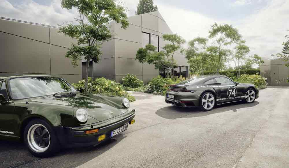 Introducing the Porsche 911 Turbo 50 Years model: Pictured here is a 1974 911 Turbo 930 (f.g.) and a 911 Turbo 50 Years model with the optional Heritage Design Package (b.g.). Credit: Porsche AG