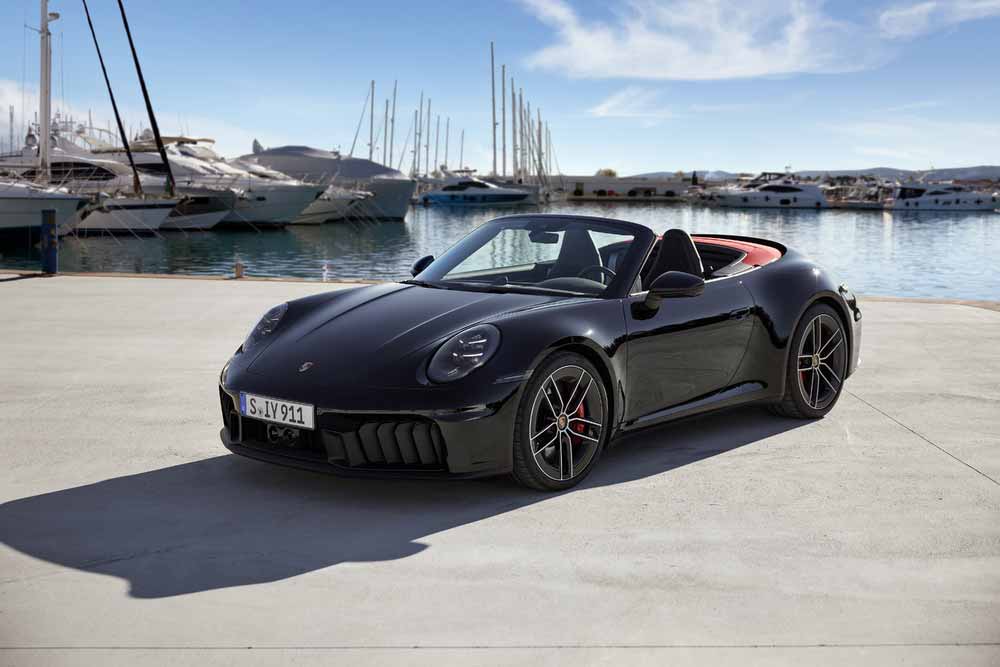 Death of the Porsche 911 Icon - depicted here is a black Cabriolet T-Hybrid, at dockside, left-front. Credit: Porsche AG.