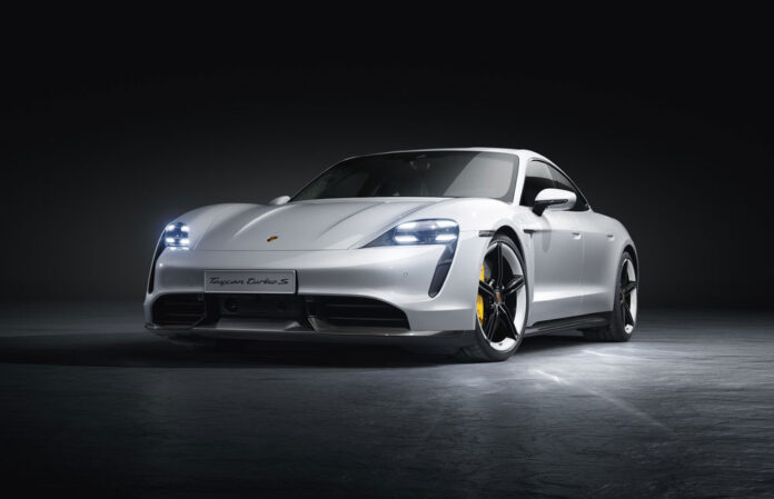 Porsche Taycan Front Brake Hose Recall: Pictured here is a gorgeous film-noirish White Taycan Turbo S, left-front, in studio. Credit: Porsche AG
