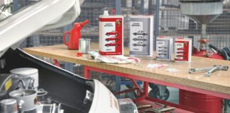 Motor Oil 101 Basics for classic air-cooled Porsche cars Pictured her is a display of Porsche Classic Motoroil in the background of a 356 in garage. Credit: Porsche AG