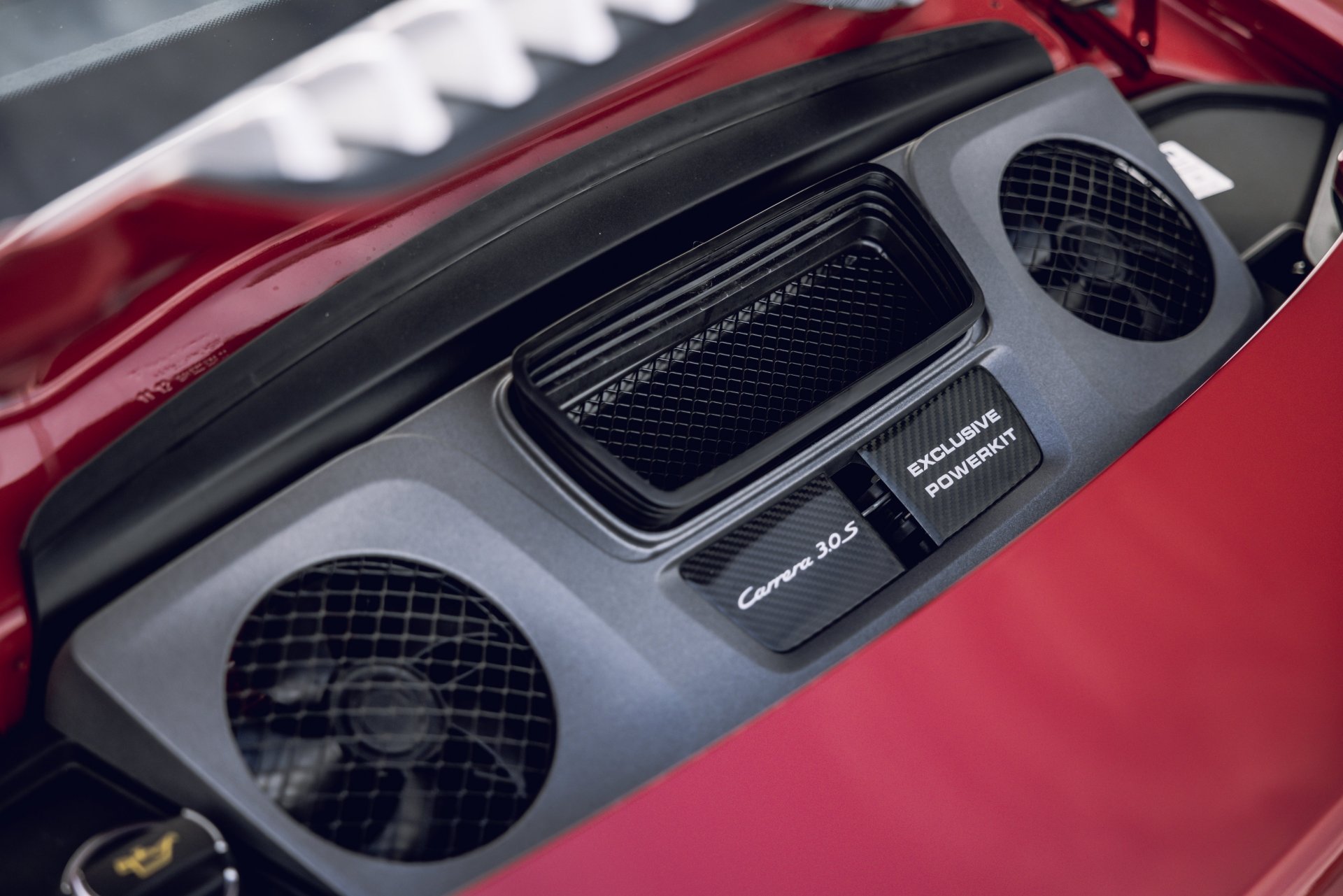 991.1-Gen Porsche 911 Buyer Guide: Pictured here is a Red 991.1 Coupe - engine bay fans. Credit: Porsche AG