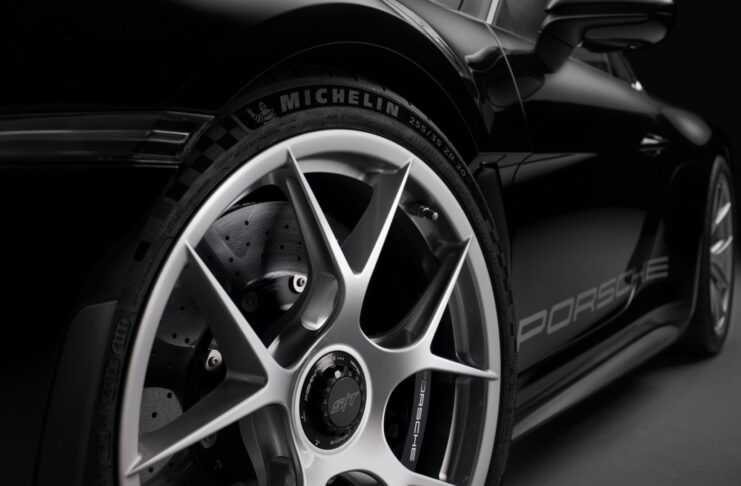 Your Complete Tire Buying Guide for Cars and SUVs 2026 Left-front Michelin on black 911 S/T. Credit: Porsche AG